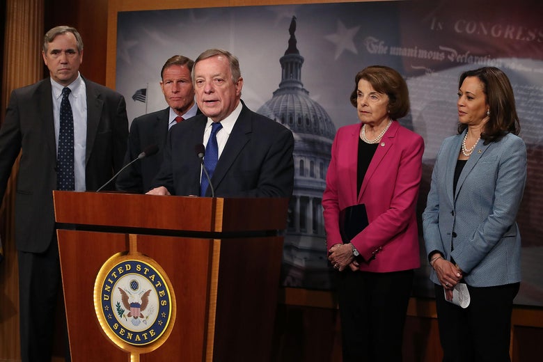 WASHINGTON, DC - JUNE 12: Senate Minority Whip Dick Durbin, (D-IL) (C), speaks about the Keep Families Together Act, which aims to prevent the separation of immigrant children from their parents, on Capitol Hill June 12, 2018 in Washington, DC. Also pictured is (L-R), Sen. Jeff Merkley, (D-OR), Sen. Richard Blumenthal (D-CT), Senate Judiciary ranking member Dianne Feinstein, (D-CA) and Sen. Kamala Harris (D-CA) (Photo by Mark Wilson/Getty Images)